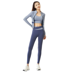 A three-piece women's workout set in grey and dark blue: a sports bra, a zip-up jacket, and leggings.