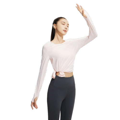 a light pink knotted-front long sleeve crop top