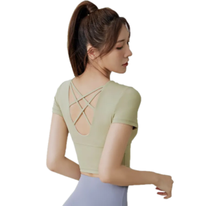 a light green cropped top with a cross-strap design on the back.