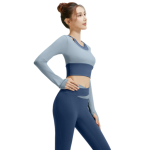 light blue long-sleeve crop top and dark blue high-waisted leggings set