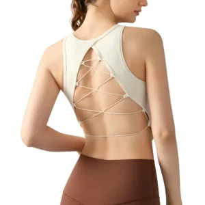 a white sports bra with an intricate criss-cross back strap design.