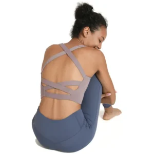 a lavender sports bra with a cross-back and open-back design