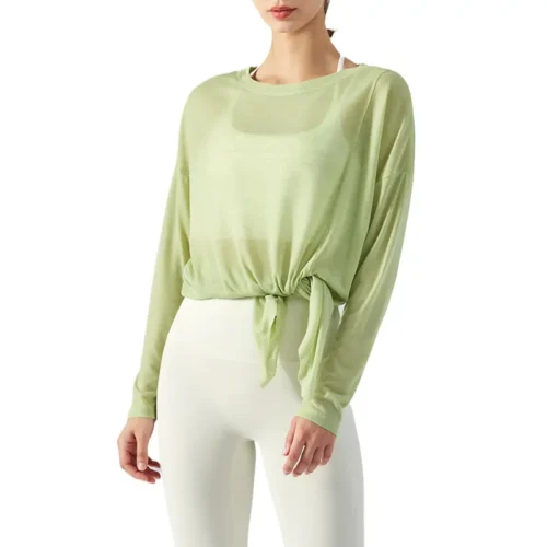 a light green long-sleeve top