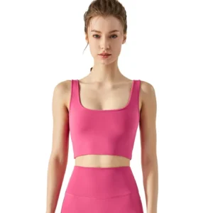 a bright pink sports crop top