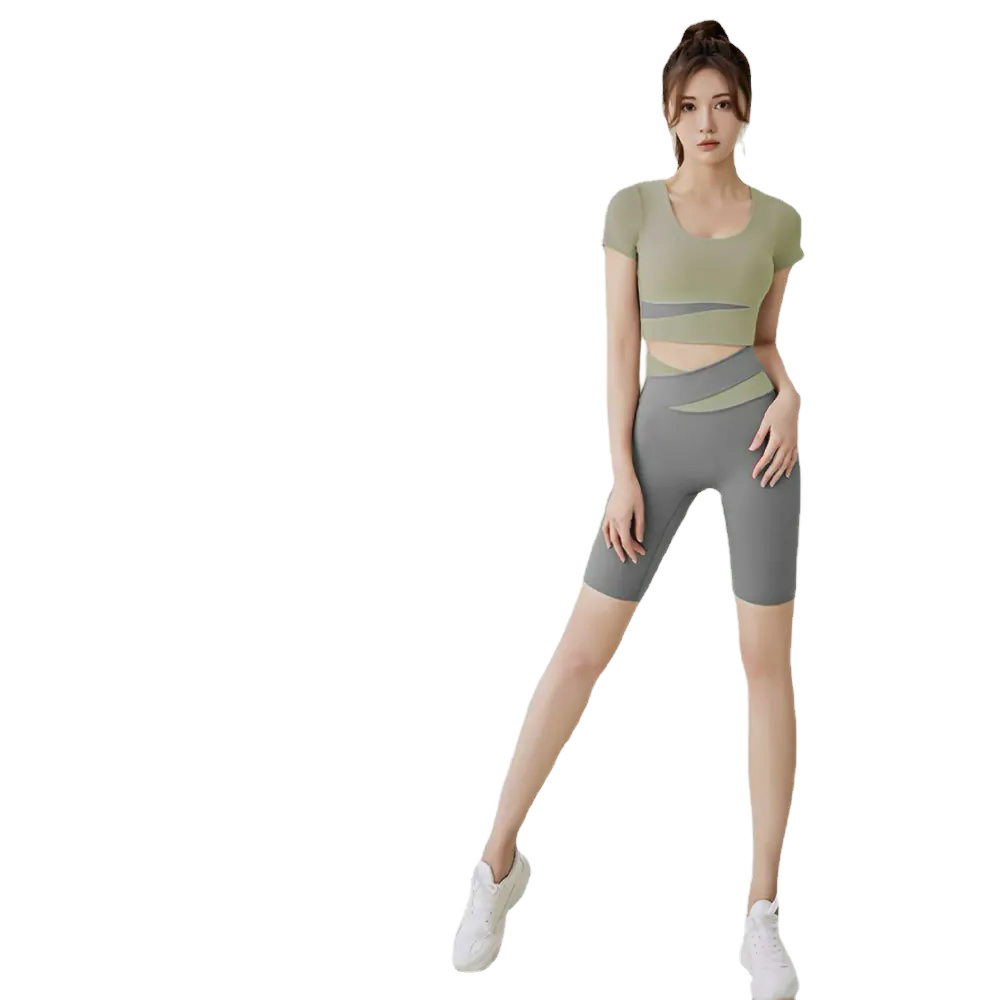two-piece sportswear set. The top is a light olive green short-sleeve shirt with a square neckline