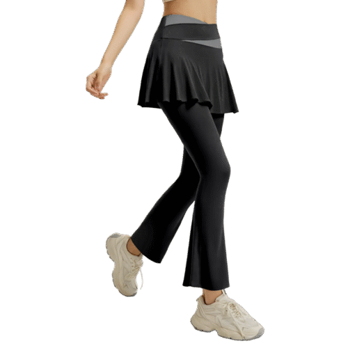 wholesale flared leggings with overskirt in black featuring ruffled hem and form-fitting silhouette