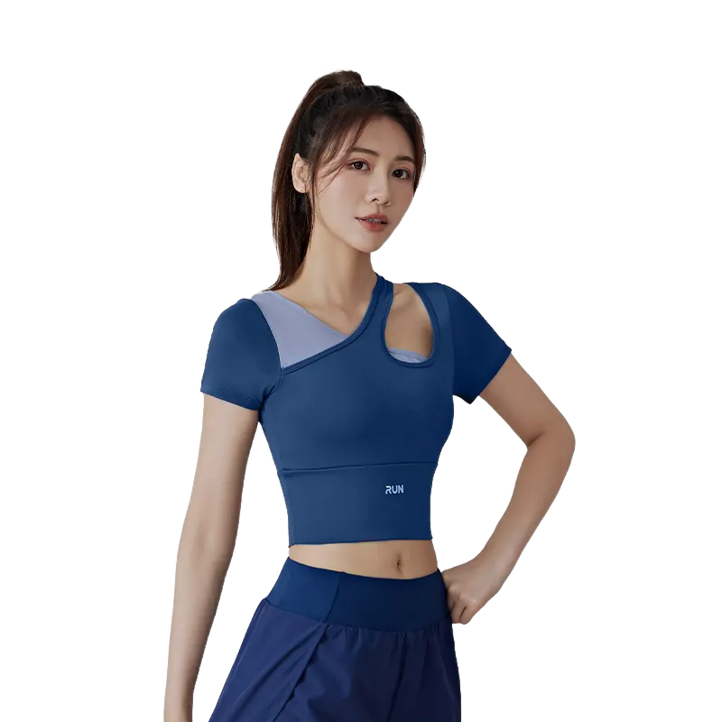 wholesale short sleeve athletic top in navy blue with asymmetrical shoulders featuring right cut-out and left grey panel