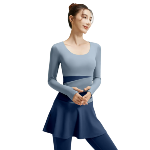 wholesale activewear set in light blue long sleeve crop top with dark blue waistband stripe, matching skirt with diagonal light blue insert, and navy leggings