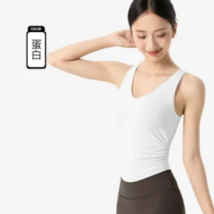 wholesale sleeveless dance top in white with V-neck and asymmetrical drape detail