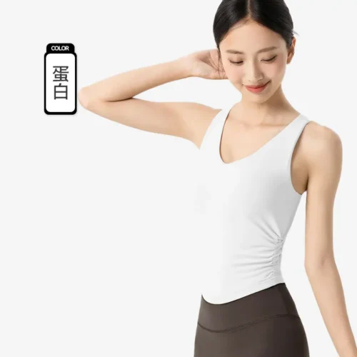 wholesale sleeveless dance top in white with V-neck and asymmetrical drape detail