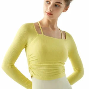 wholesale long sleeve athletic top in light yellow with crossover neck detail