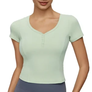 wholesale short sleeve top in light seafoam green with V-neck and button front detail