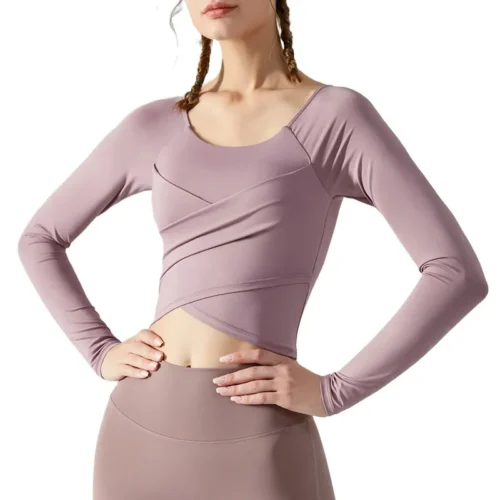 wholesale light purple sports top with crossover neck and cut-out waist detail