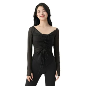 wholesale long sleeve top in black with deep V-neck and ruffle detail