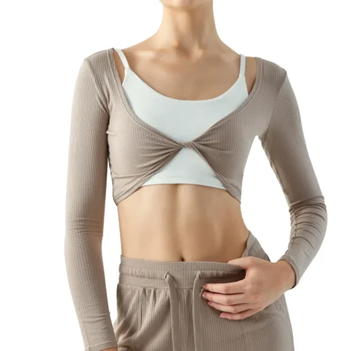 wholesale light beige long sleeve cardigan with cross-over collar detail, worn over a white tank top and matching pants