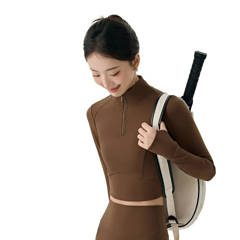 wholesale activewear set in deep brown with high-neck zip-up cropped top and high-waist shorts