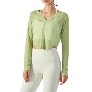 a light green V-neck long-sleeve crop top