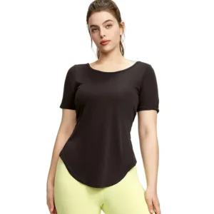 a fitted dark crewneck tee. The top features a curved hem