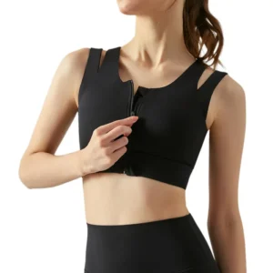 a black sports bra featuring a full-length front zipper, open shoulder cut-outs, and a slightly relaxed hem