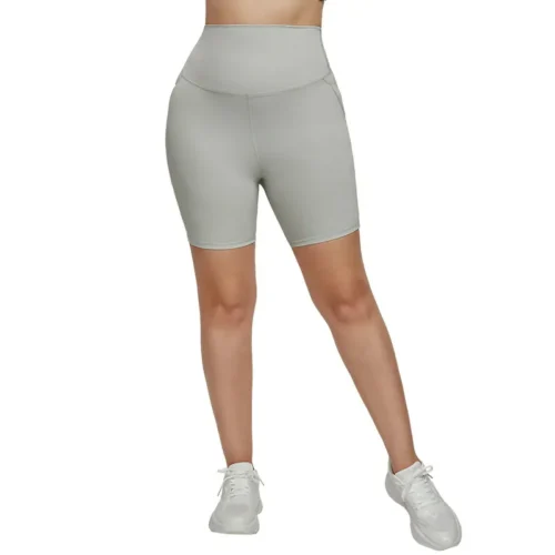 a light grey high-waisted fitted athletic short with matching top