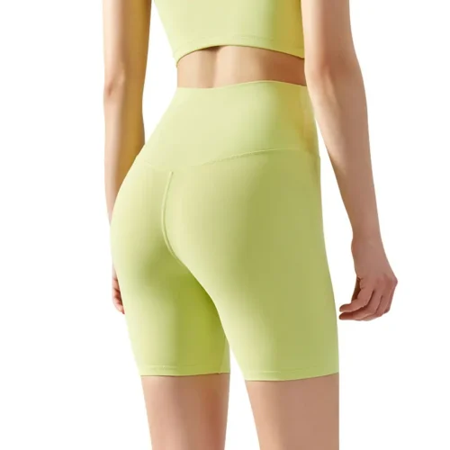 ight green high-waisted athletic shorts, back view