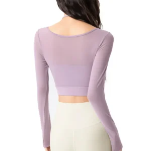 wholesale activewear set in light purple long sleeve top with mesh cutout detail and dark grey high-waist yoga pants