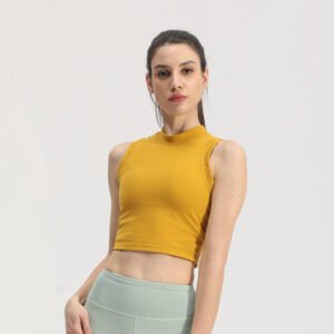 a vivid mustard yellow sleeveless high-neck crop top.