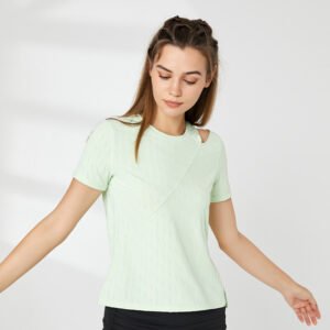 a light green short-sleeve T-shirt with a fashionable cut-out detail on the left shoulder.