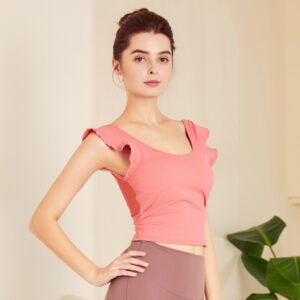 a light pink ruffled crop top